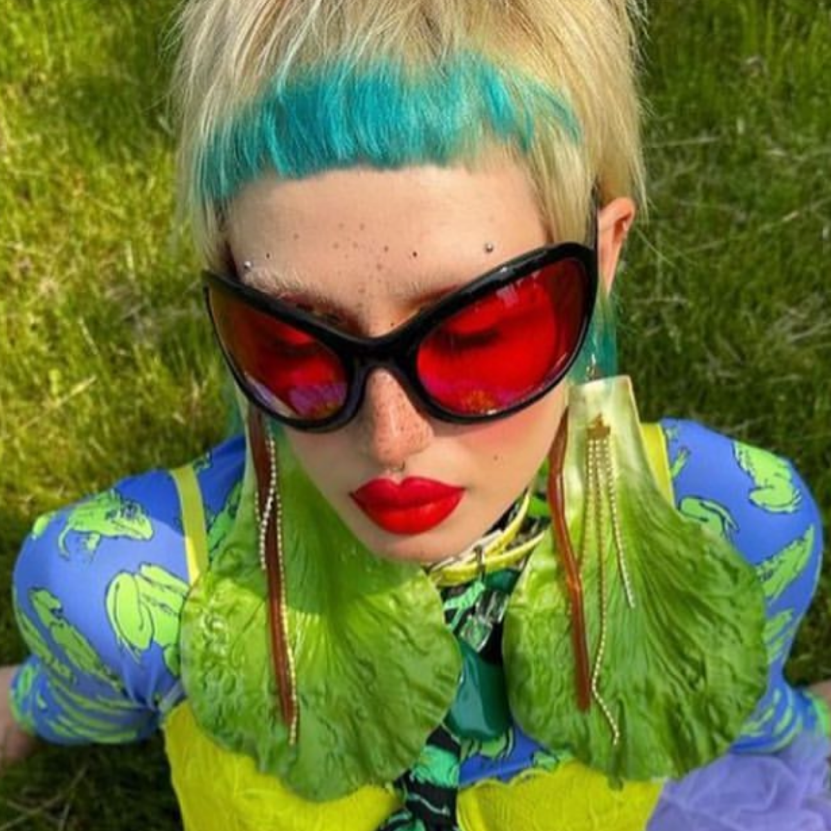 Trendy girl wearing BIGGIE bug eye funky sunglasses by Giant Vintage