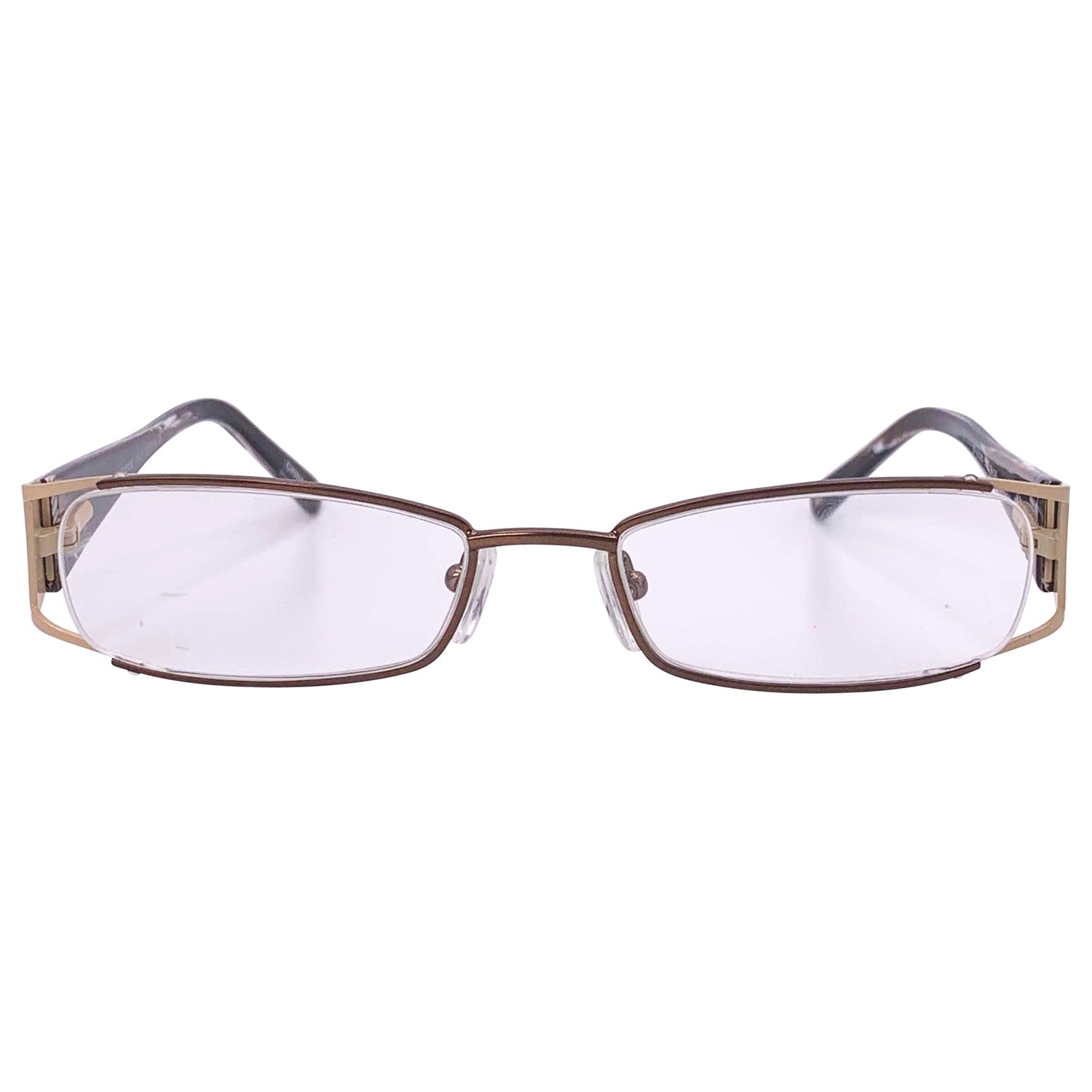 clear retro glasses with a 90s tan frame style