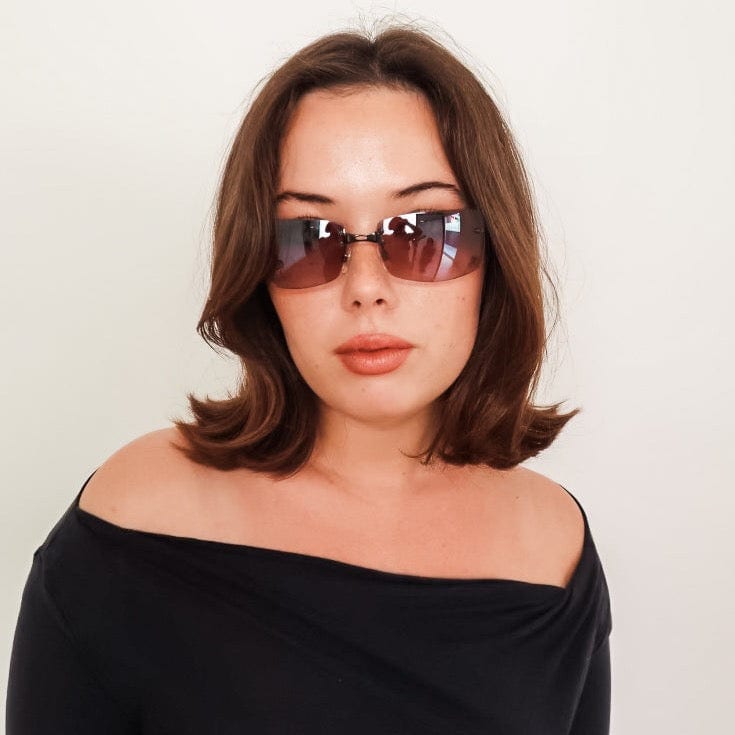 Model wearing smoke GLITTER Y2k Sunglasses