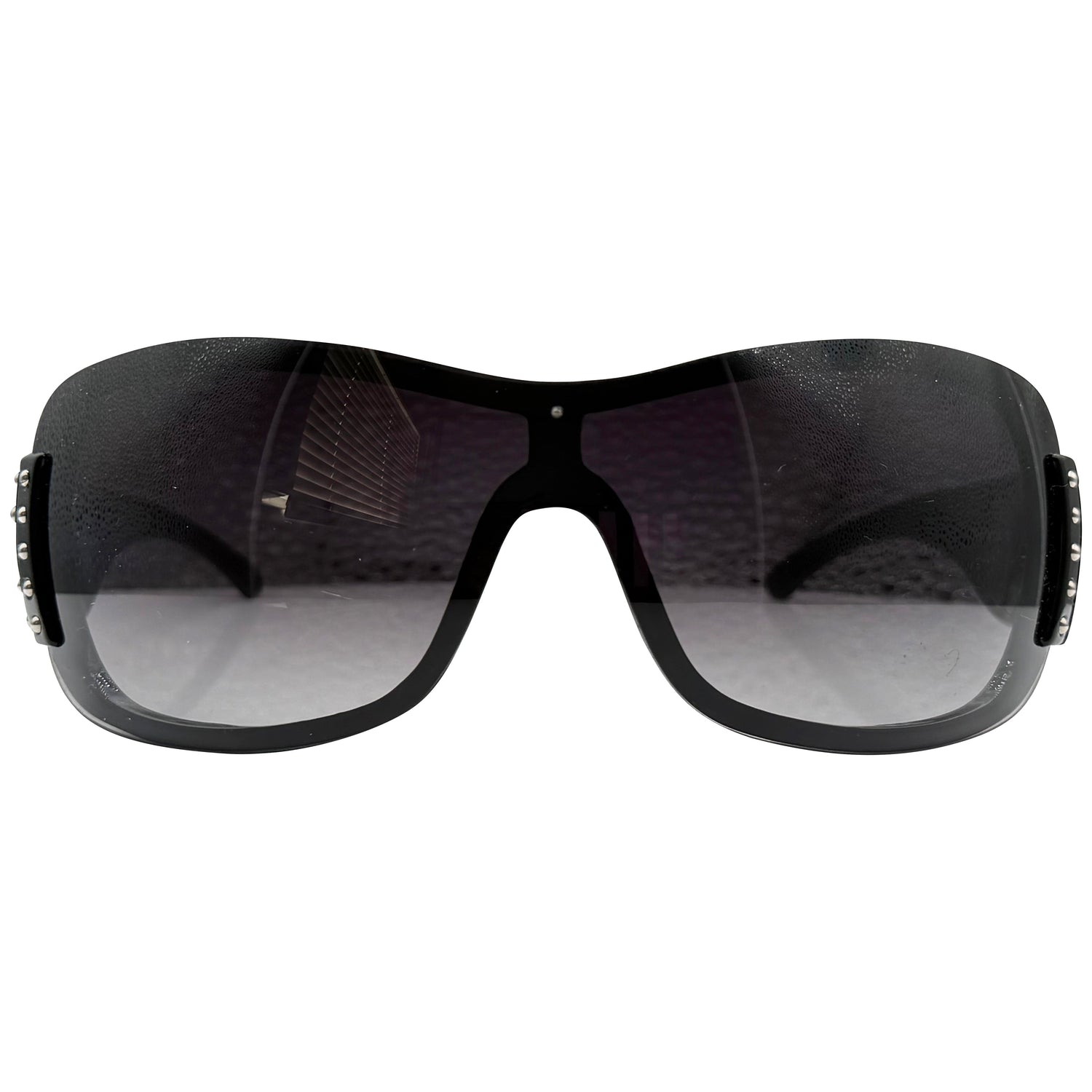 A pair of HANNAH oversized shield-style sunglasses with a thick black frame and dark gray gradient lenses, shown against a plain white background.