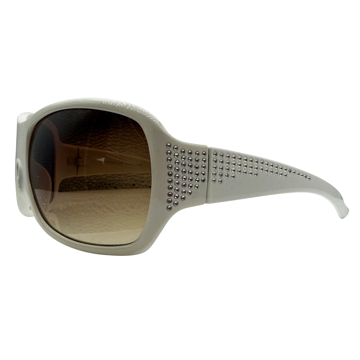 A pair of GLITZ AND GLAM women's sunglasses with a chunky, rounded off-white frame embellished with small silver studs, featuring brown gradient lenses, shown against a plain white background.
