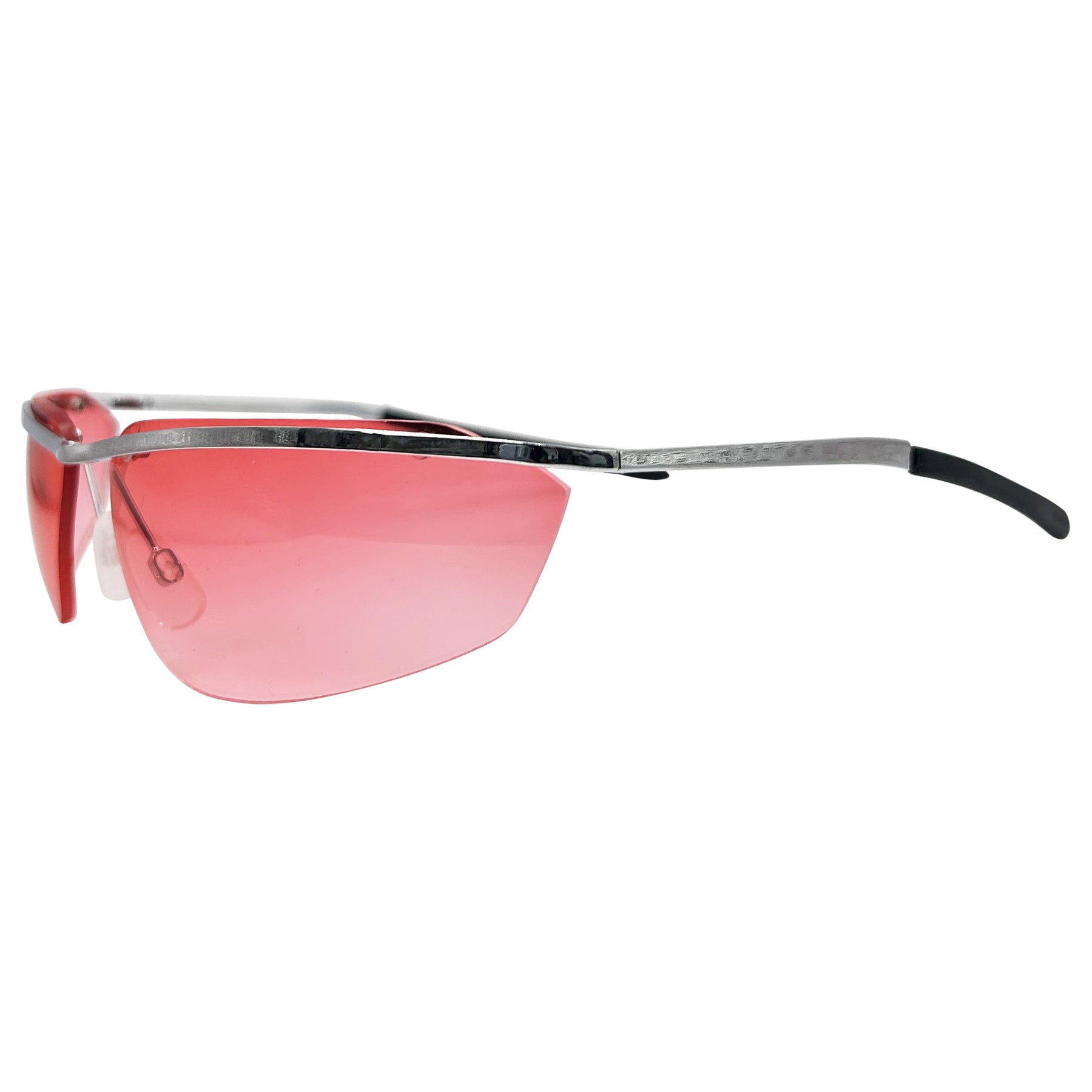 red lens sunglasses with a y2k rimless metal frame 
