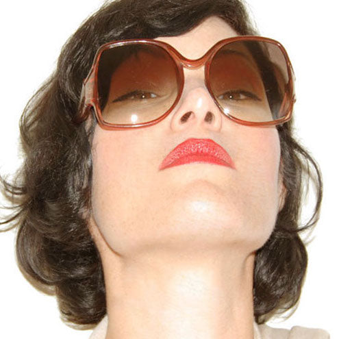 woman in oversized brown retro sunglasses at Giant Vintage Sunglasses