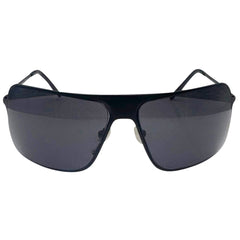 Front view of EVERYTHING Square Sunglasses featuring a matte black metal frame, a wide flat-top bridge, and solid dark charcoal lenses on a white background.