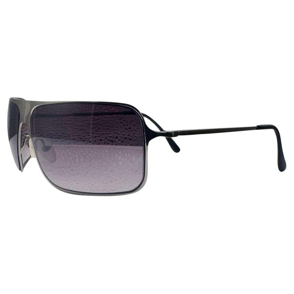Side profile of EVERYTHING Square Sunglasses in Silver Smoke, highlighting the sleek silver frame construction, slim temples, and the gradient transition of the oversized lenses.