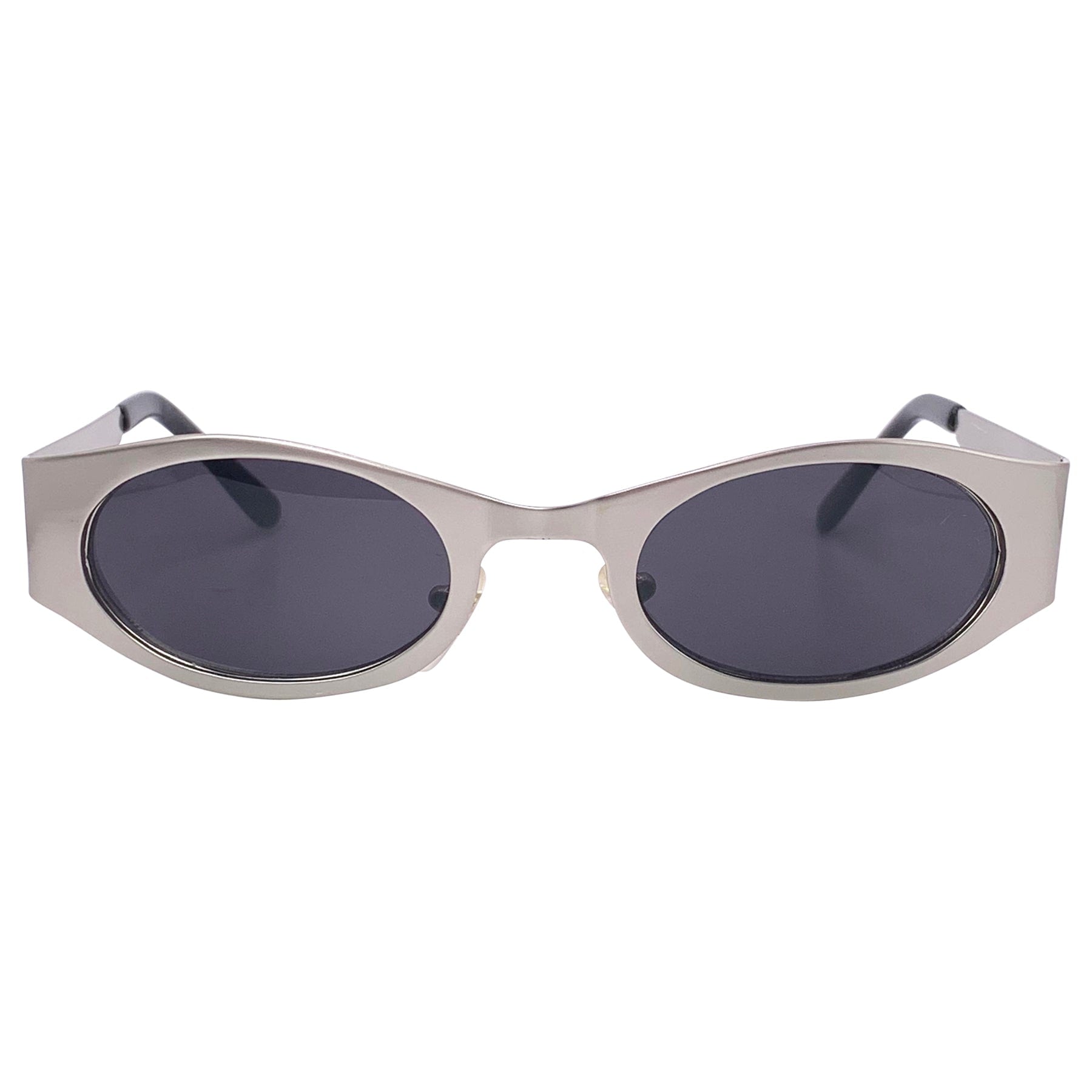 90s retro sunglasses with a silver metal frame and super dark lens