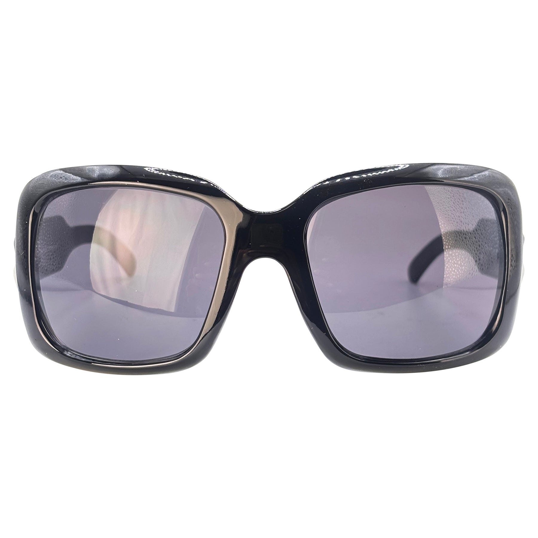 Classic oversized silhouette with edgy contemporary detailing sunglasses 