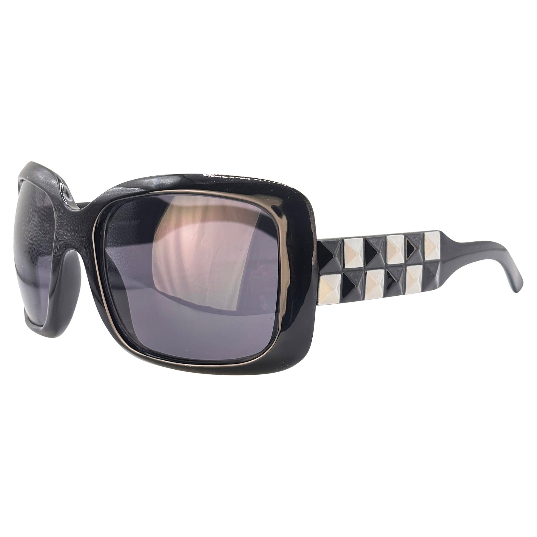 Classic oversized silhouette with edgy contemporary detailing sunglasses 