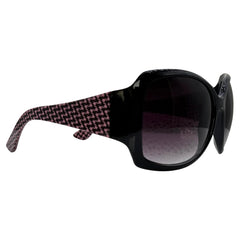 A pair of women's OXFORD sunglasses featuring a glossy black frame, gradient dark lenses, and patterned pink and black houndstooth temple arms, shown against a plain white background.