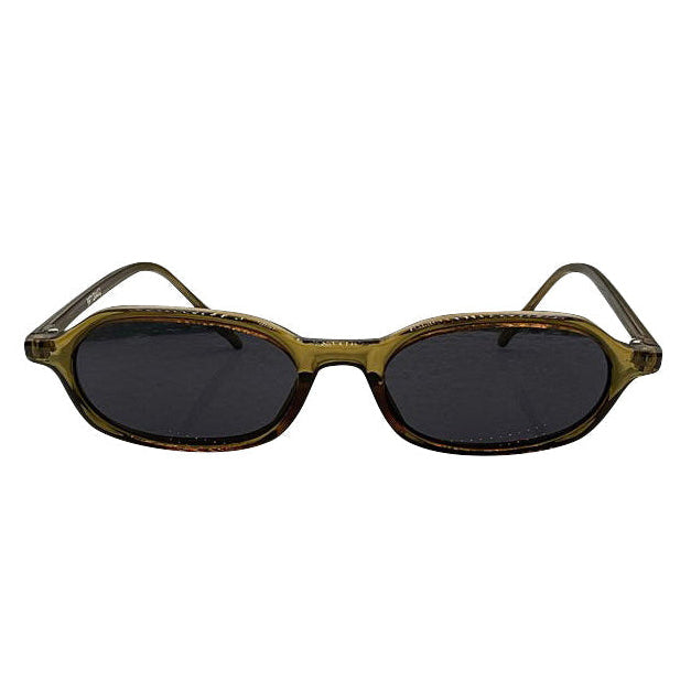 Retro LOCO 90's sunglasses showcasing a vibrant green slim-profile frame paired with coordinating tinted lenses, delivering a bold pop of vintage color.