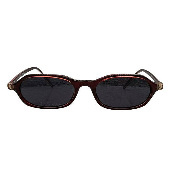 Iconic LOCO 90's sunglasses with a sleek, bright red rectangular frame and dark lenses, capturing an edgy, high-energy throwback style.