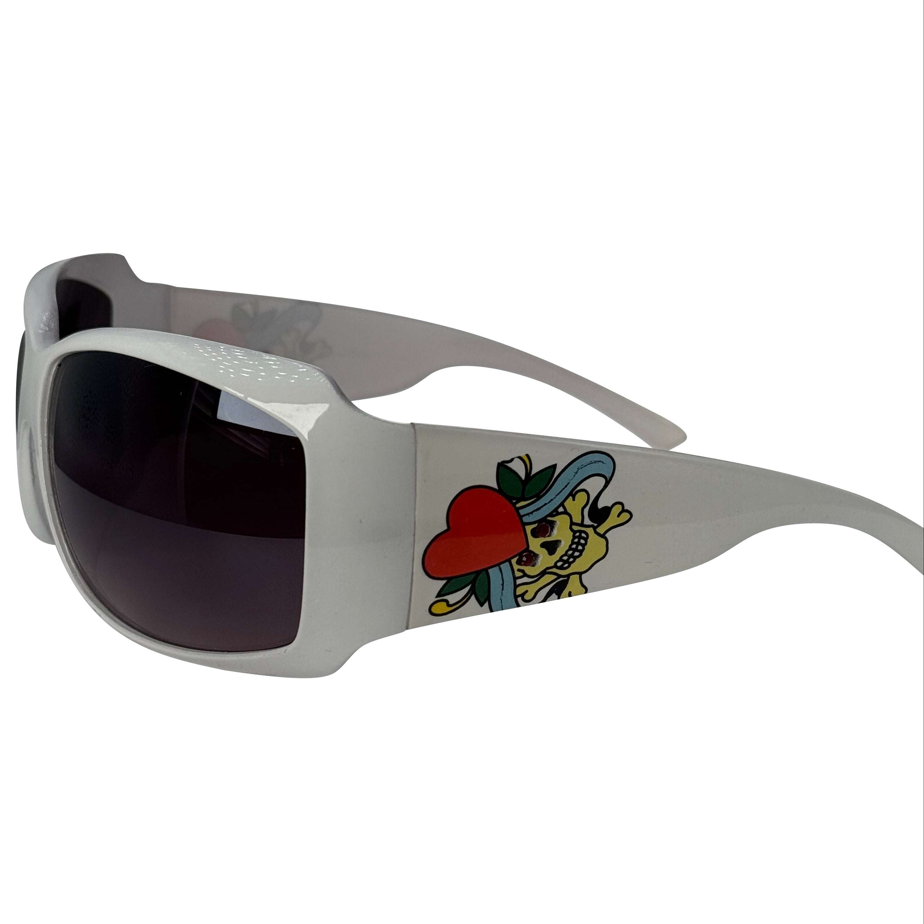 White wrap-around sunglasses with dark tinted lenses and a colorful tattoo-style graphic on the side, shown against a plain white background.