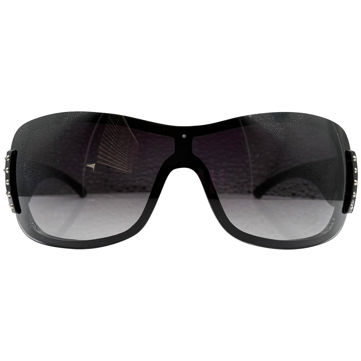 A pair of HANNAH oversized shield-style sunglasses with a thick black frame and dark gray gradient lenses, shown against a plain white background.