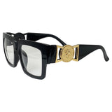huge chunky square glasses with a clear lens and gold embellishment for a vintage look