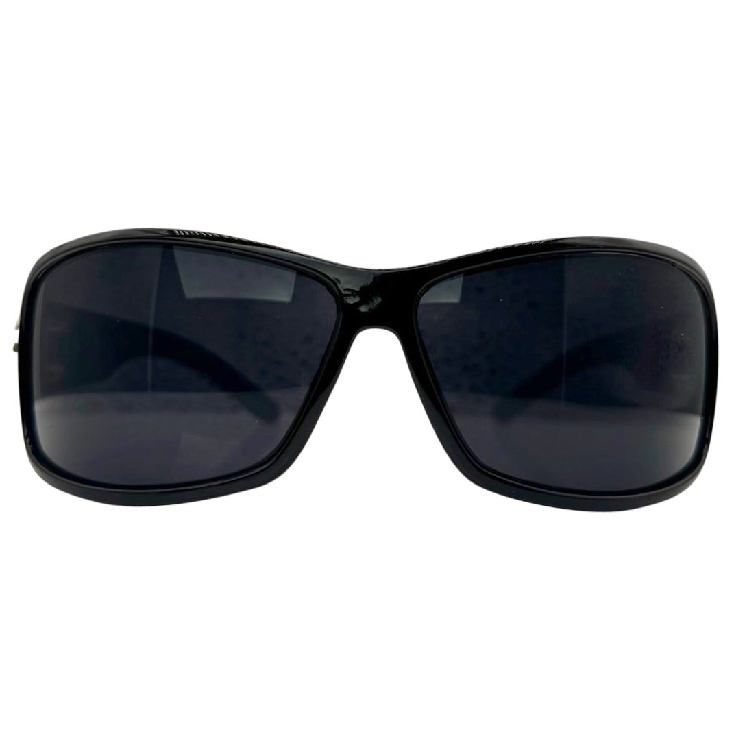 Front view of MYSTERY Shield Sunglasses in a glossy black finish, featuring a bold wrap-around frame and solid 