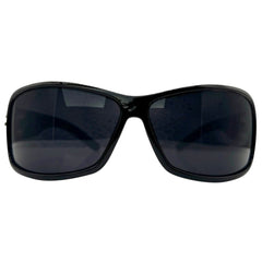 Front view of MYSTERY Shield Sunglasses in a glossy black finish, featuring a bold wrap-around frame and solid "Super Dark" charcoal lenses.
