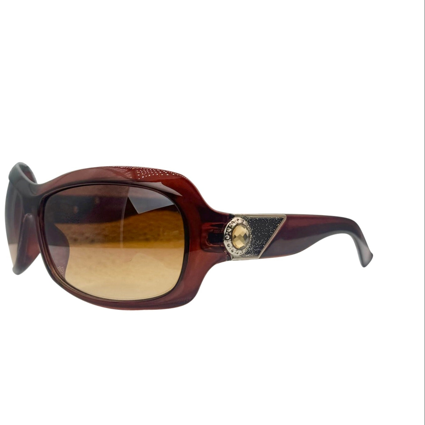 Side profile of NICOLE Shield Sunglasses in brown, showing the thick, contoured temples and the wrap-around frame design.