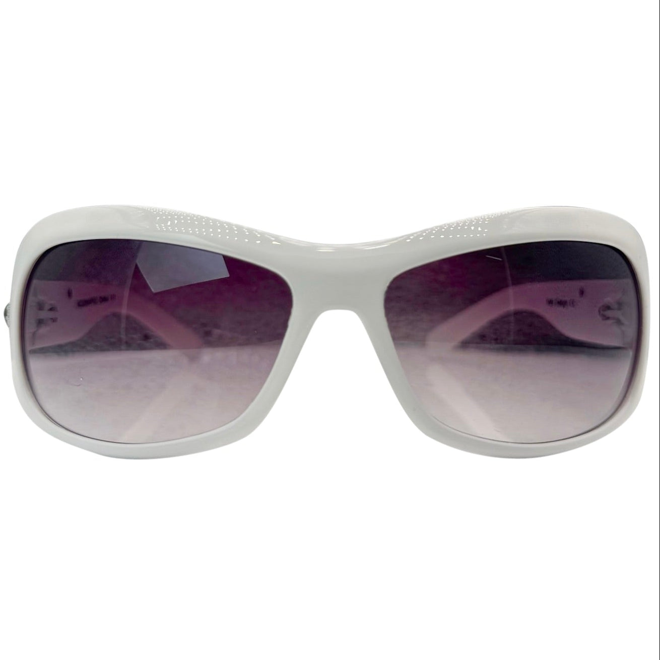 Front view of NICOLE Shield Sunglasses in a clean white frame with contrasting dark smoke lenses.