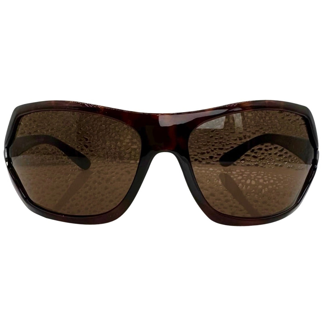 Modern front view of tortoise EXOTIC Shield sunglasses with a bold, polished black frame and dark gradient lenses, showcasing an edgy aesthetic.