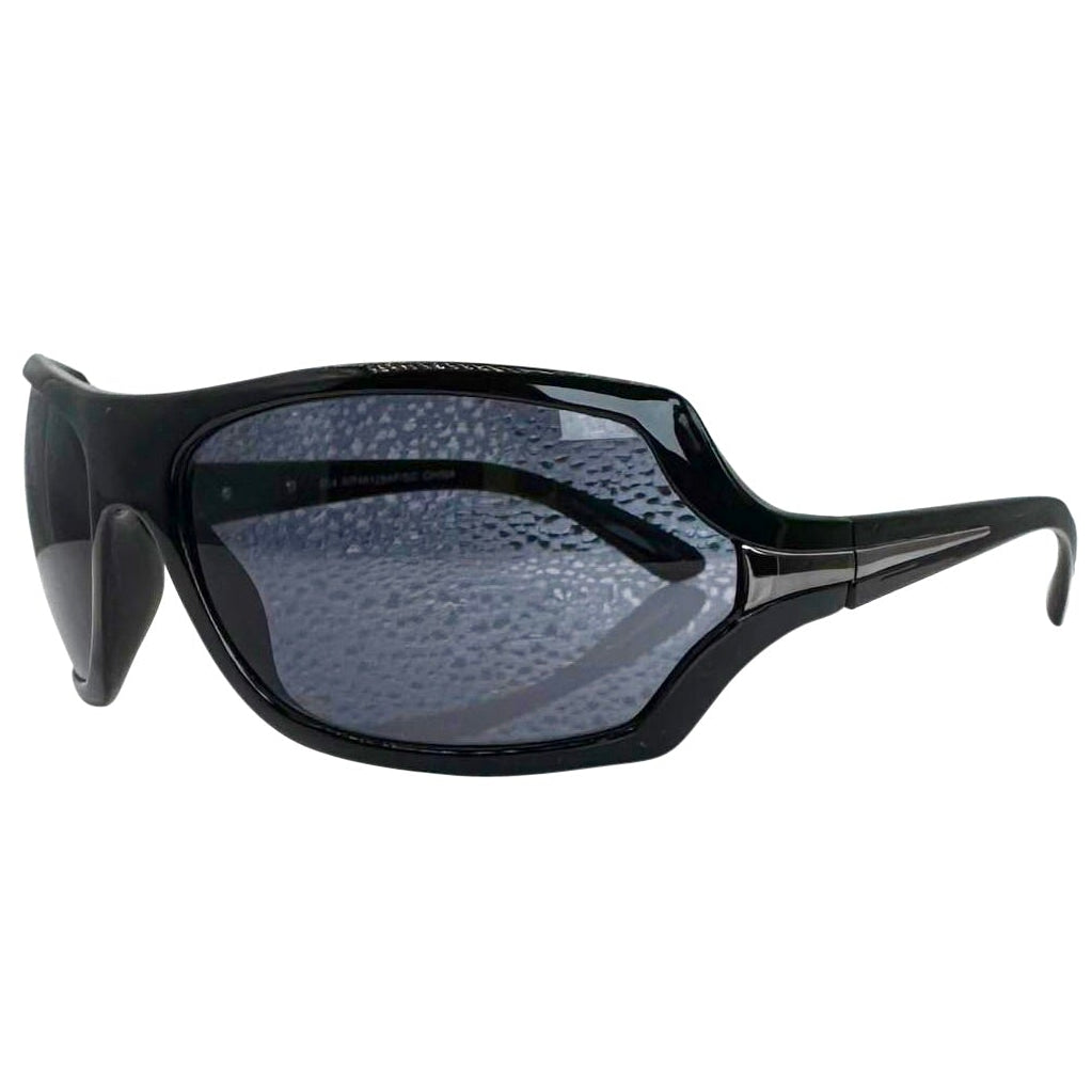 Modern side view of Black EXOTIC Shield sunglasses with a bold, polished black frame and dark gradient lenses, showcasing an edgy aesthetic.
