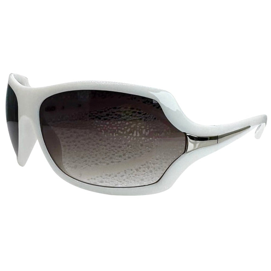 Modern side view of White EXOTIC Shield sunglasses with a bold, polished black frame and dark gradient lenses, showcasing an edgy aesthetic.