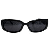 Front view of SHOCKER 90's sunglasses featuring a bold, chunky black rectangular frame with dark tinted lenses for a classic grunge-inspired look.