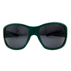 A pair of GLITZ AND GLAM oversized square sunglasses with a dark green frame and dark gray lenses, shown against a plain white background.