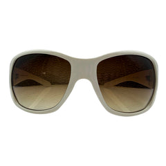 A pair of GLITZ AND GLAM oversized square sunglasses with a thick off-white frame and brown gradient lenses, shown against a plain white background.