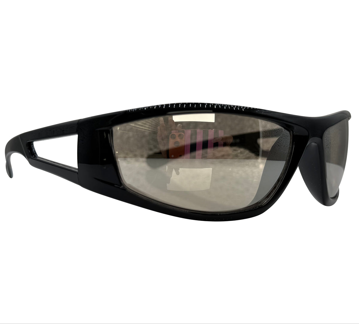 Black wrap-around sunglasses with a thick black frame and tinted lenses, shown from a side angle on a white background.