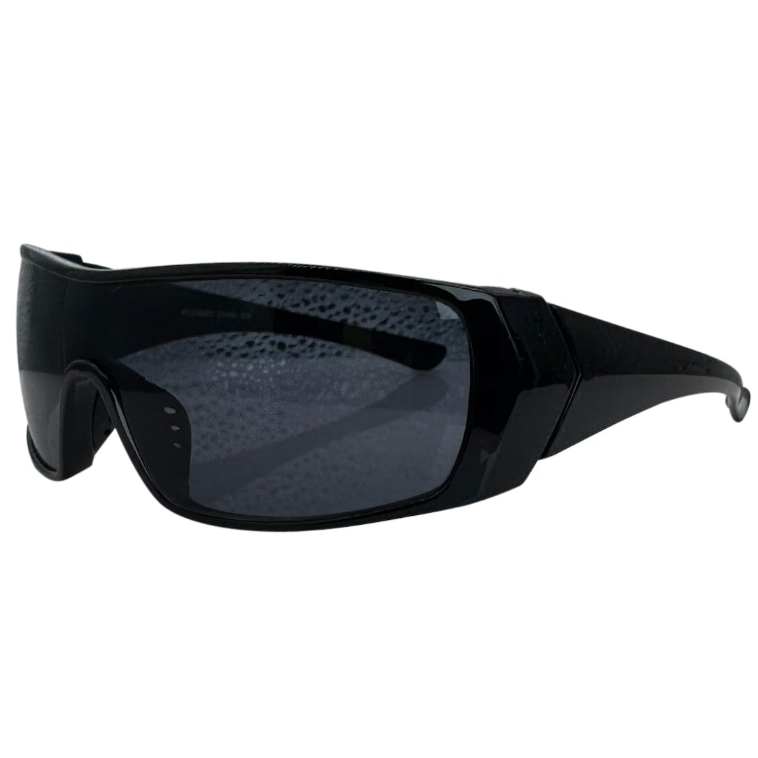 Modern side view of the Black RUNNER shield sunglasses with a sleek matte gunmetal grey frame, showcasing a sharp, industrial silhouette and wide wrap-around shield lenses.