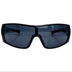 Modern front view of the Black RUNNER shield sunglasses with a sleek matte gunmetal grey frame, showcasing a sharp, industrial silhouette and wide wrap-around shield lenses.