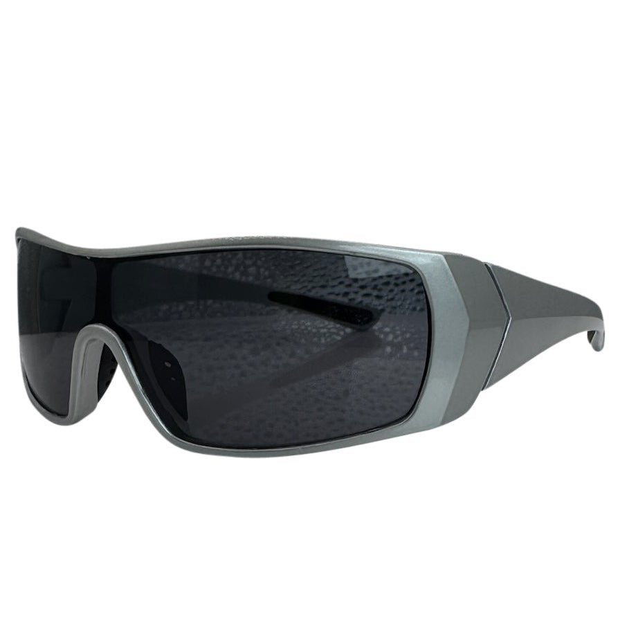 Modern side view of the Black RUNNER shield sunglasses with a sleek matte gunmetal grey frame, showcasing a sharp, industrial silhouette and wide wrap-around shield lenses.