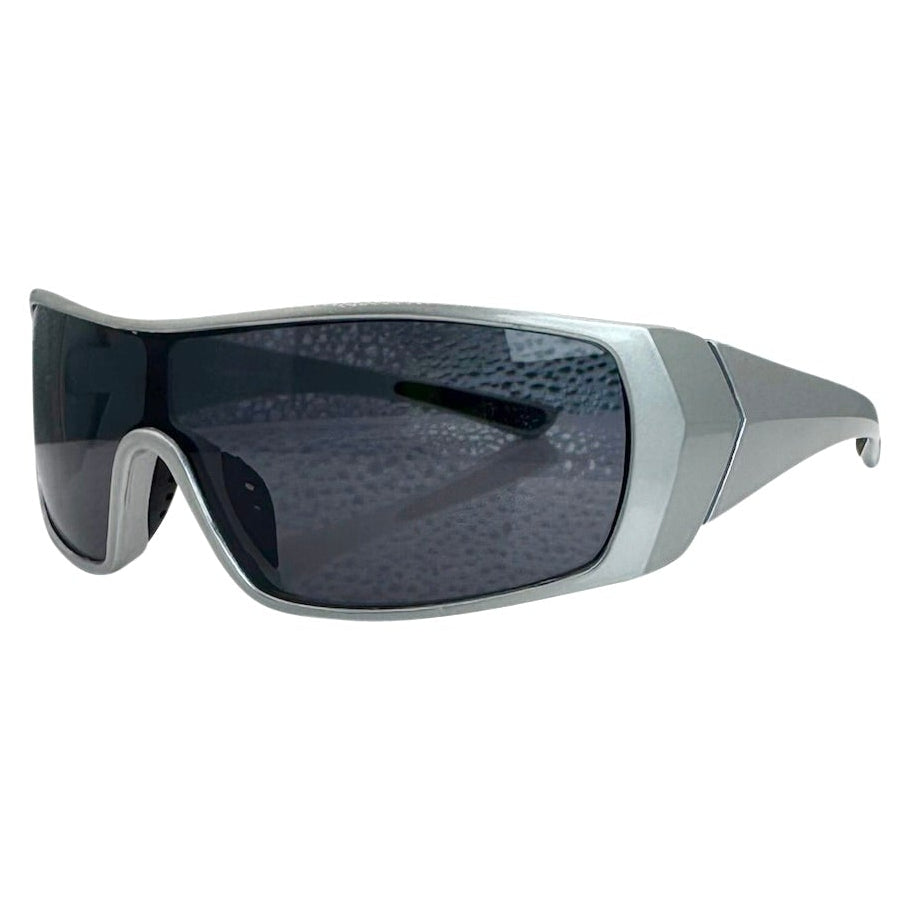 Modern side view of the Grey RUNNER shield sunglasses with a sleek matte gunmetal grey frame, showcasing a sharp, industrial silhouette and wide wrap-around shield lenses.