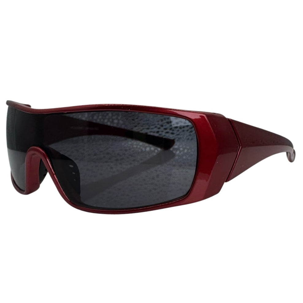 Modern side view of Red RUNNER shield sunglasses with a sleek matte gunmetal grey frame, showcasing a sharp, industrial silhouette and wide wrap-around shield lenses.
