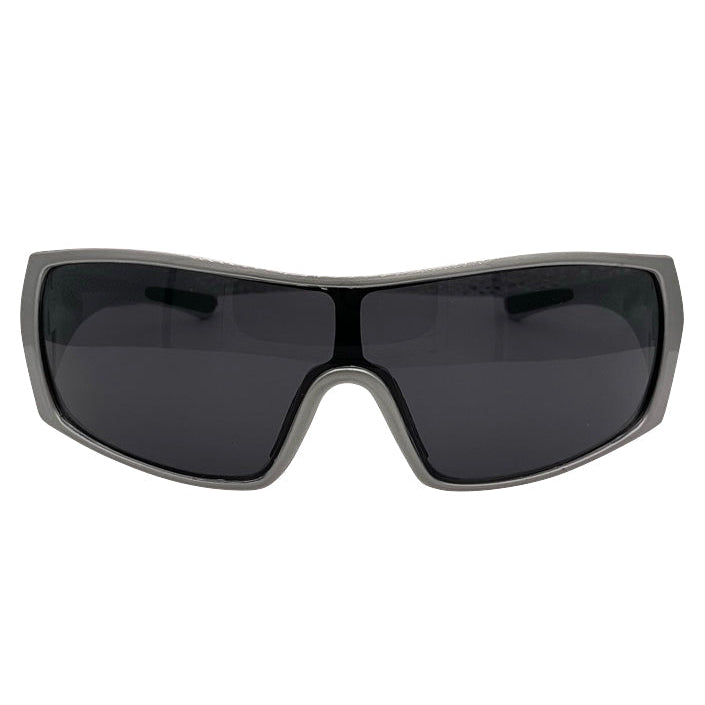 Modern RUNNER shield sunglasses with a sleek matte gunmetal grey frame, showcasing a sharp, industrial silhouette and wide wrap-around shield lenses.