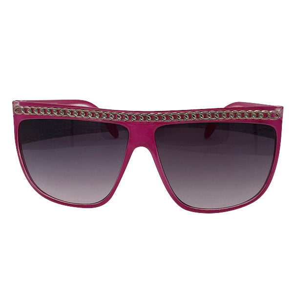 Front View SCANDAL sunglasses showcasing a bright pink oversized shield frame accented with a metallic chain detail and soft gradient lenses for a high-fashion look.