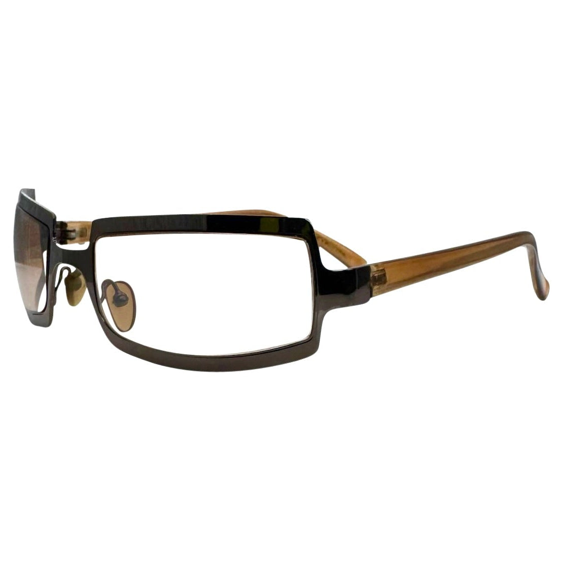 Side view of Brown SHIMMER glasses featuring a high-shine silver metal frame with a unique cutout brow design and clear lenses for a futuristic Y2K look.