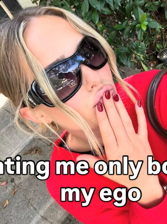 Instagram post showing Person wearing sunglasses and a red jacket with text overlay outdoors.