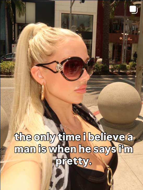 Instagram post showing Woman wearing sunglasses with text overlay on a city street background