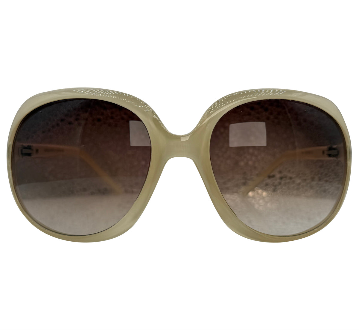 Oversized sunglasses with a thick, chunky beige frame and gradient brown lenses, shown against a plain white background.