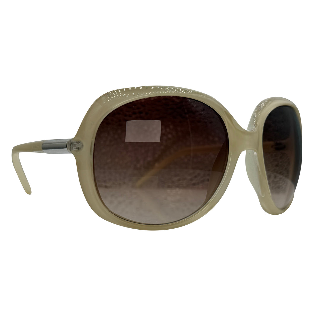 Oversized sunglasses with a textured beige frame and gradient brown lenses, shown from a three-quarters angle on a white background.