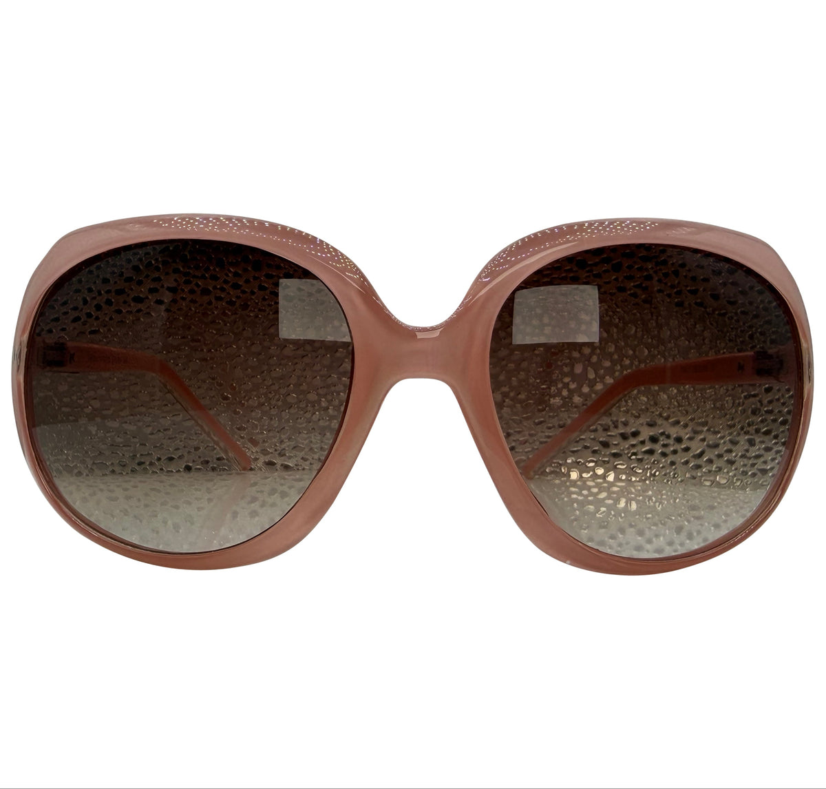 Oversized sunglasses with a textured brown frame and gradient brown lenses, shown against a plain white background.